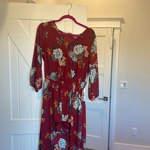 Red/Floral romper. Long tail and sleeves. Worn once. Size M. Brand is Wrangler.